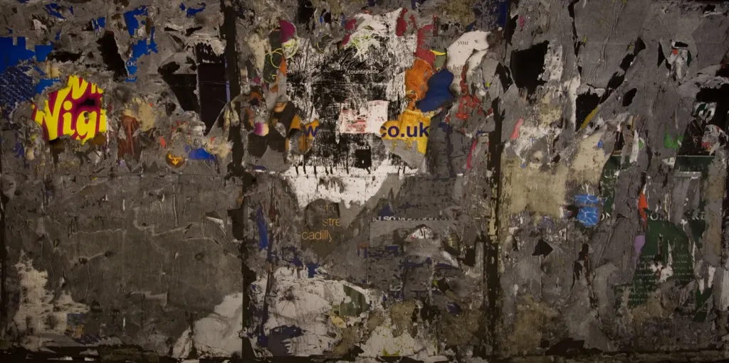 Fate. A close study of accumulated posters, erasure and accidental marks in the city.