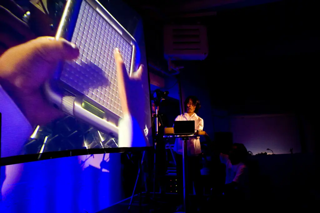 Close-up of a performer using the Yamaha TENORI-ON