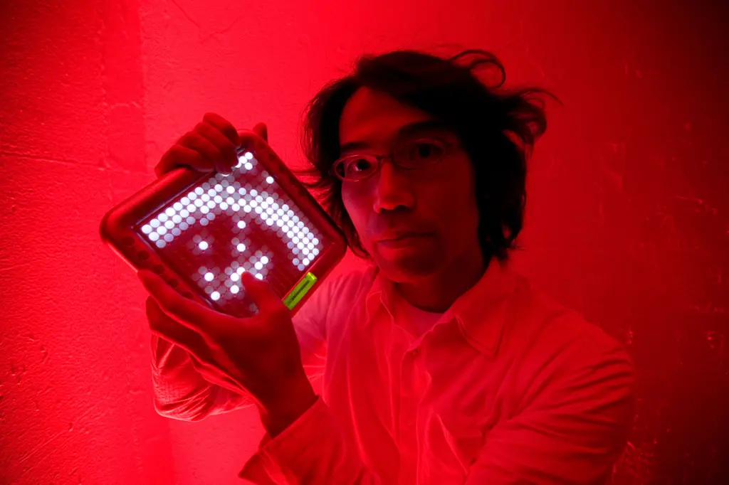 Portrait of Toshio Iwai with the Yamaha TENORI-ON